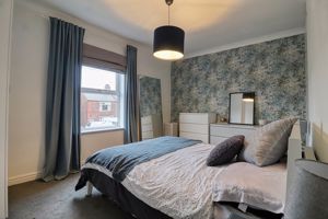 Bedroom One- click for photo gallery